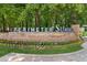 Monument sign for Perimeter Summit community entrance with landscaping at 10 Perimeter Summit Ne Blvd # 4243, Brookhaven, GA 30319