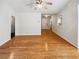 Spacious room with hardwood floors, neutral colors and plenty of natural light at 145 Shadowbrook Trce, Covington, GA 30016