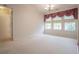 Bright and spacious bedroom with large windows, neutral carpet, and ample natural light at 2180 Briarwood Ct, Villa Rica, GA 30180