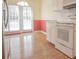 Bright dining area features hardwood floors, large windows, and a modern lighting fixture at 2180 Briarwood Ct, Villa Rica, GA 30180