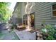Charming backyard with a seating area and manicured landscaping, ideal for outdoor entertaining at 2534 Norwood Park Xing, Atlanta, GA 30340