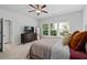 Bright bedroom with large windows, a ceiling fan, and a comfortable layout for relaxation at 2534 Norwood Park Xing, Atlanta, GA 30340
