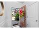 Light-filled entryway with views of exterior and modern door at 2534 Norwood Park Xing, Atlanta, GA 30340