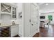 Modern bar area featuring granite countertops, a wine fridge, and custom cabinetry at 3113 Lenox Ne Rd # 6, Atlanta, GA 30324