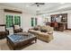 Cozy basement living room with a bar, comfortable seating, and ample space for relaxing at 3113 Lenox Ne Rd # 6, Atlanta, GA 30324