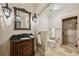 Elegantly appointed bathroom with granite vanity, a separate toilet area, and glass-enclosed shower at 3113 Lenox Ne Rd # 6, Atlanta, GA 30324