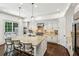 Gourmet kitchen with large center island, stainless steel appliances, and pendant lighting at 3113 Lenox Ne Rd # 6, Atlanta, GA 30324