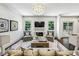 Bright living room with fireplace, chandelier, and decorative area rug at 3113 Lenox Ne Rd # 6, Atlanta, GA 30324