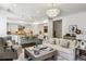 Spacious living room with open layout to kitchen and view of stairway at 3113 Lenox Ne Rd # 6, Atlanta, GA 30324