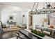 Open concept home featuring a sitting room and dining room with refinished hardwood floors at 3113 Lenox Ne Rd # 6, Atlanta, GA 30324