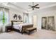 Comfortable main bedroom with a large bed, bedside tables, and decorative art at 3113 Lenox Ne Rd # 6, Atlanta, GA 30324
