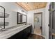 Bathroom featuring a vanity with double sinks and marble countertop at 2170 Jonquil Ct, Canton, GA 30115