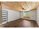 Bedroom boasting hardwood floors, built in shelving, and a window seat at 2170 Jonquil Ct, Canton, GA 30115