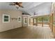 Exterior of screened porch showcasing a ceiling fan and furniture at 2170 Jonquil Ct, Canton, GA 30115
