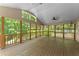 Spacious screened porch with a view of the wooded backyard at 2170 Jonquil Ct, Canton, GA 30115