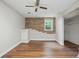 Finished basement with painted brick accents, offering flexible living space at 2384 Shadowood Sw Dr, Conyers, GA 30094
