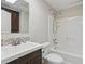 Cozy bathroom with white countertops and a shower-over-tub combo at 2384 Shadowood Sw Dr, Conyers, GA 30094