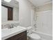 Bathroom featuring a sink, cabinet and a shower and bathtub combination at 2384 Shadowood Sw Dr, Conyers, GA 30094