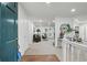 Bright foyer featuring hardwood floors and a view into the spacious living area at 2384 Shadowood Sw Dr, Conyers, GA 30094