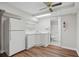 Basement kitchenette featuring a sink, cabinets and refrigerator at 2384 Shadowood Sw Dr, Conyers, GA 30094