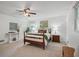 Serene main bedroom with soft carpet, natural light, and decorative accents at 2384 Shadowood Sw Dr, Conyers, GA 30094