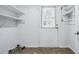 Mud room featuring tile floors, white walls, and an exit door with exterior access at 2384 Shadowood Sw Dr, Conyers, GA 30094