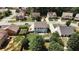 Neighborhood aerial view of a home with a large backyard, patio, and proximity to lush greenery and nearby houses at 258 Creek View Ln, Acworth, GA 30102