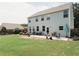 Expansive backyard featuring a patio with outdoor seating, perfect for entertaining and relaxation at 258 Creek View Ln, Acworth, GA 30102