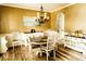 Elegant dining room with a chandelier, hardwood floors, and stylish decor at 258 Creek View Ln, Acworth, GA 30102