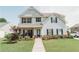 Inviting two-story home with blue shutters, stone accents, and a cozy front porch at 258 Creek View Ln, Acworth, GA 30102