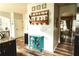 Bright and airy kitchen with modern decor, stylish shelving, and a view to dining area at 258 Creek View Ln, Acworth, GA 30102