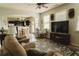 Cozy living room with plush seating, open to kitchen and plenty of natural light at 258 Creek View Ln, Acworth, GA 30102