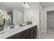Bathroom featuring double sinks, modern fixtures and plenty of counter space at 2700 Westgate Park Dr, Loganville, GA 30052