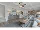Open concept living room offering a view of the modern kitchen at 2700 Westgate Park Dr, Loganville, GA 30052