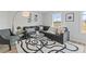 Cozy living room with comfortable seating, modern decor, and plenty of natural light at 2700 Westgate Park Dr, Loganville, GA 30052
