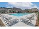 Community pool with ample seating offers a refreshing outdoor space for residents and their guests at 2700 Westgate Park Dr, Loganville, GA 30052