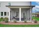 Relaxing screened porch with comfortable outdoor seating, perfect for enjoying the fresh air at 2700 Westgate Park Dr, Loganville, GA 30052