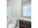 Bathroom features a shower-tub combination and granite vanity at 3018 Old Covington Rd, Covington, GA 30014
