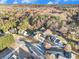 A picturesque aerial perspective of homes surrounded by trees, showcasing neighborhood street layout at 128 Graybrook Ct, Grayson, GA 30017