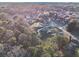 An elevated perspective of tree-lined properties in a suburban community, offering a glimpse of tranquil living at 128 Graybrook Ct, Grayson, GA 30017