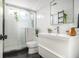 Bathroom with a modern sink and shower, with live plants throughout at 128 Graybrook Ct, Grayson, GA 30017
