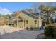 A charming, detached residential structure with a private driveway and well-kept landscaping at 128 Graybrook Ct, Grayson, GA 30017