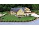Charming home featuring a well-manicured lawn and lovely landscaping at 128 Graybrook Ct, Grayson, GA 30017