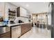Modern kitchen featuring sleek cabinetry and an open design at 128 Graybrook Ct, Grayson, GA 30017