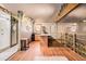 Kitchenette area showcasing granite counters, modern appliances, and glass partitions to another area at 128 Graybrook Ct, Grayson, GA 30017