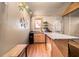 Bright kitchenette features granite counters, modern appliances, and decor, seamlessly blending style and function at 128 Graybrook Ct, Grayson, GA 30017