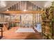 Open floor plan with a kitchen, living room and second floor, all connected by vine decor at 128 Graybrook Ct, Grayson, GA 30017