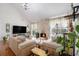 Bright living room with fireplace, vaulted ceilings, and stylish decor at 128 Graybrook Ct, Grayson, GA 30017