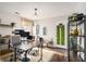 Bright home office with hardwood floors, a large desk and natural light at 128 Graybrook Ct, Grayson, GA 30017