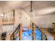 Indoor pool area with waterfall feature and upper-level view of shower area at 128 Graybrook Ct, Grayson, GA 30017